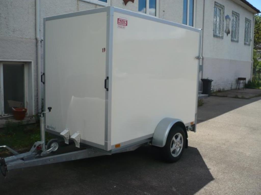 used car and single-axle trailer