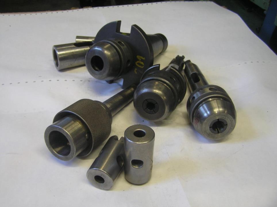 Tool set for machine tools - milling heads, fixed inserts and reductions