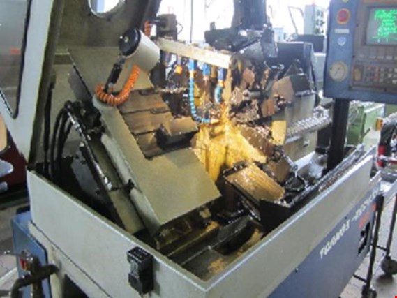 Used Tornos ENC 16 CNC lathe defect for Sale (Trading Premium) | NetBid Industrial Auctions