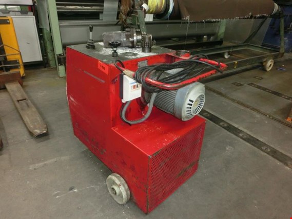 Used Asisa DES-COMP hydr. fabric winder for Sale (Auction Premium) | NetBid Industrial Auctions