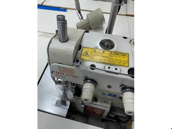 Used JUKI MO 6704 S-OE4-40H Sewing machine for Sale (Auction Premium) | NetBid Industrial Auctions